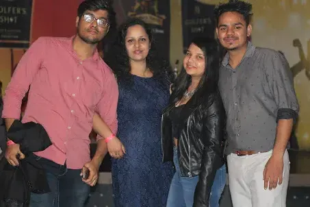 Four Supplymint colleagues smiling together at a team night out