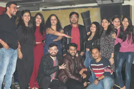 Supplymint team members posing together at an evening team party