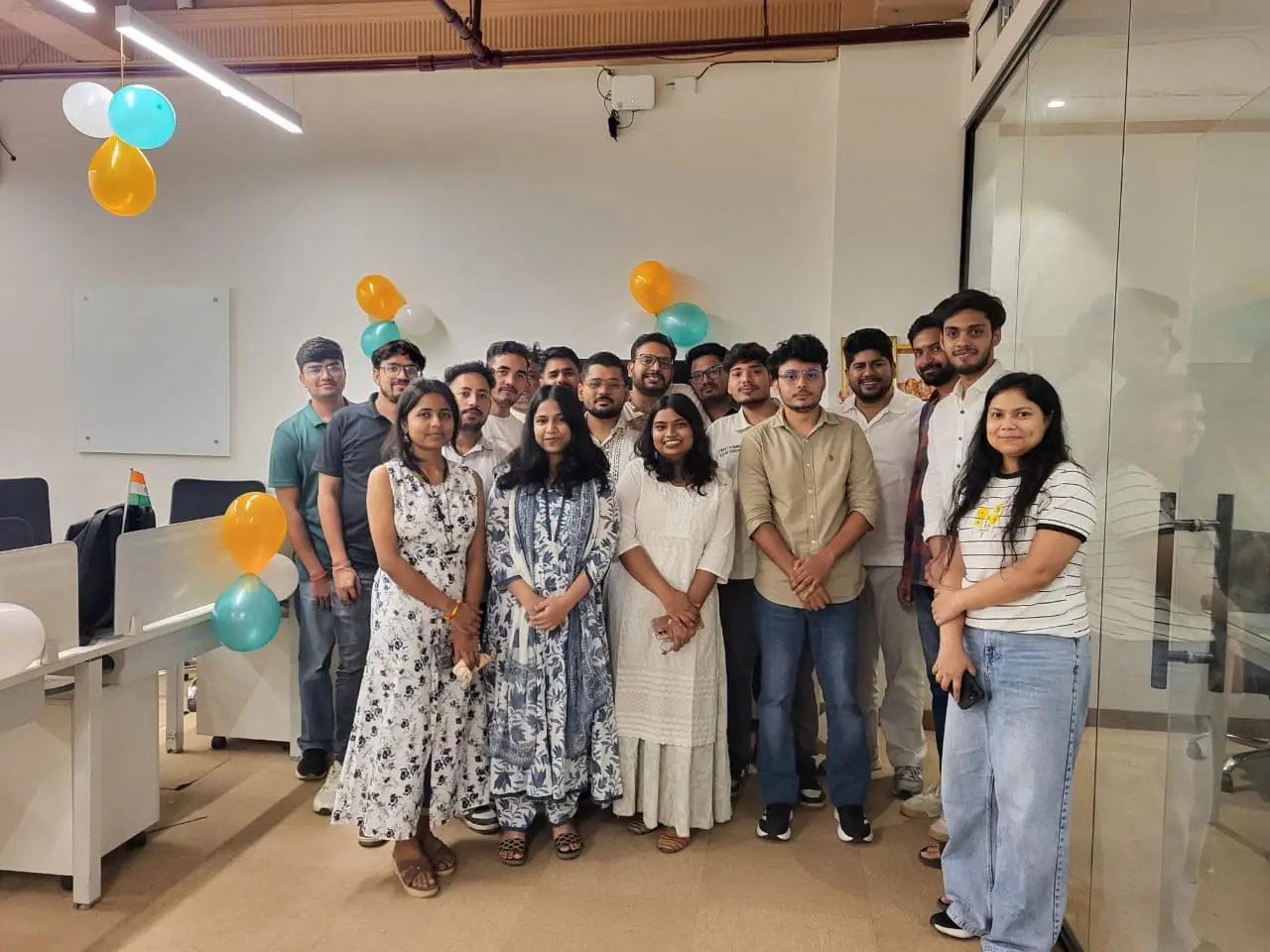 Full Supplymint team standing together at the office for an Independence Day celebration